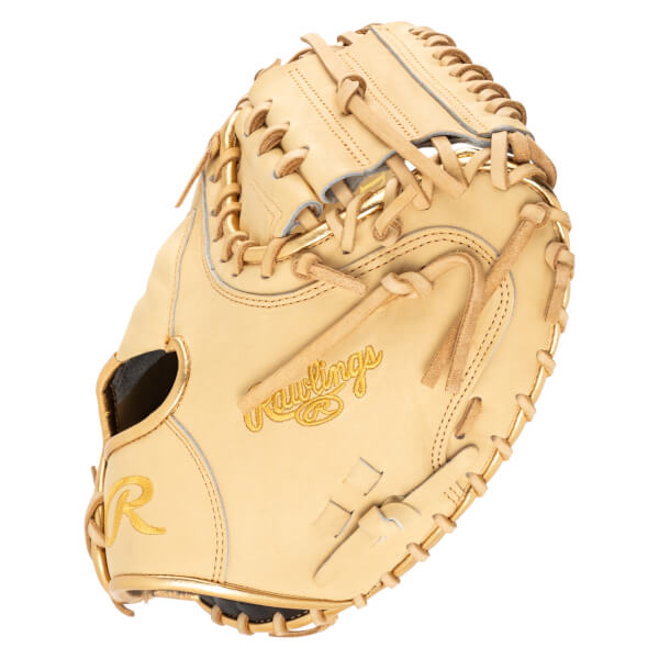 Top-down view of a tan baseball glove with gold "Rawlings" embroidery and a gold "R" logo.