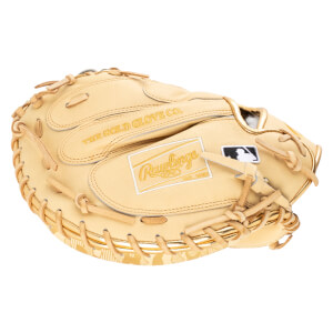 Top-down view of a tan baseball glove with gold accents, featuring "Rawlings" and "MLB" logos.