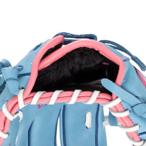 Close-up of a blue baseball glove with pink accents, showing the lacing and interior lining.