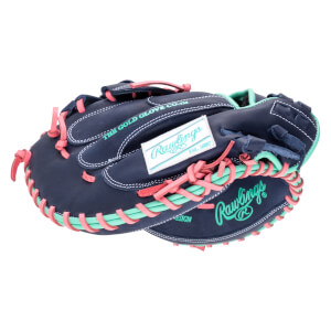 Top-down view of a navy baseball glove with pink and teal lacing, featuring "Rawlings" and "The Gold Glove Co." text.