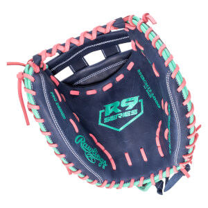 Top-down view of a navy baseball glove with pink and teal lacing, featuring "R9 SERIES" and "Rawlings" logos.