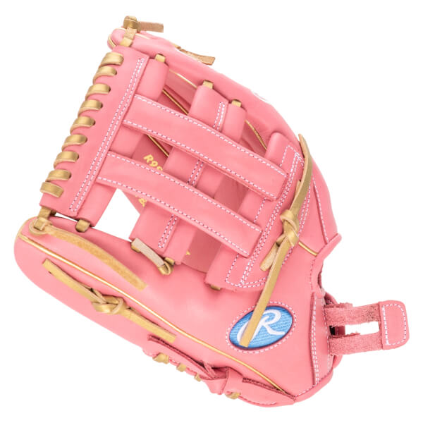Side view of a pink baseball glove with gold lacing and a Rawlings logo.