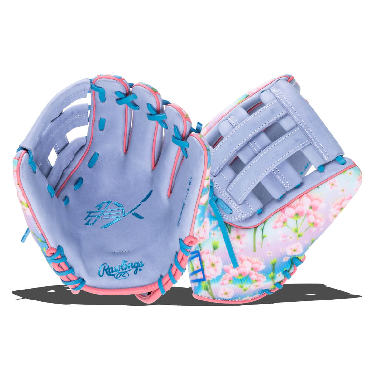Front view of a lavender baseball glove with pink and blue lacing, a floral pattern, and "Rawlings" logo.