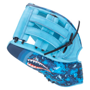 Side view of a blue baseball glove with a shark graphic and digital camouflage pattern.