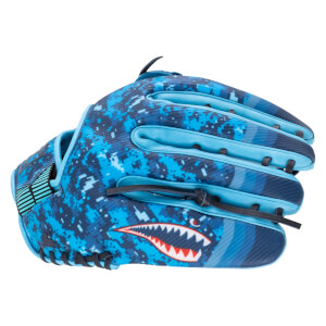 Side view of a blue baseball glove with a pixelated camouflage pattern and a shark graphic.