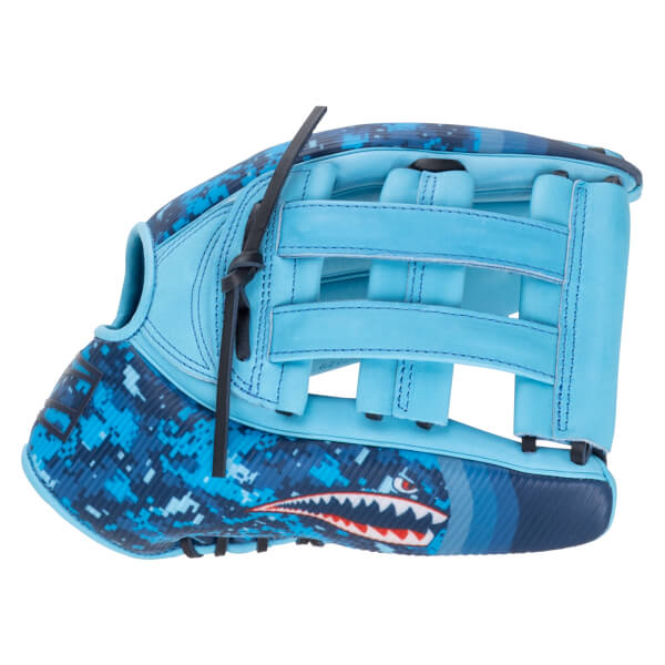 Side view of a blue baseball glove with a digital camouflage pattern and a shark graphic.