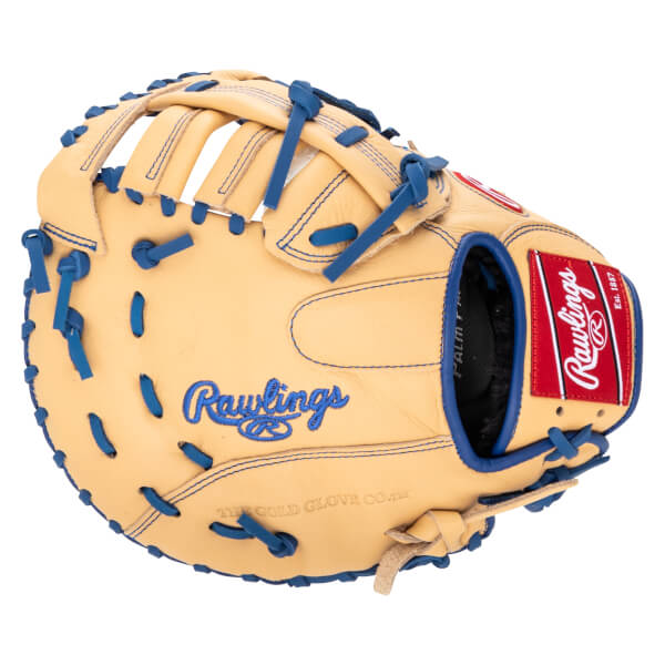 Top-down view of a tan Rawlings baseball glove with blue lacing and a red Rawlings logo patch.