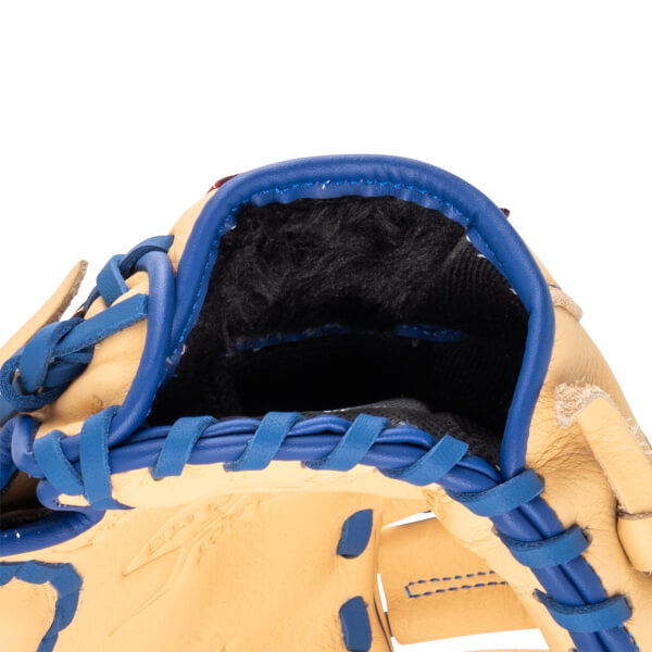 Close-up of a tan baseball glove's interior with blue lacing and black lining.