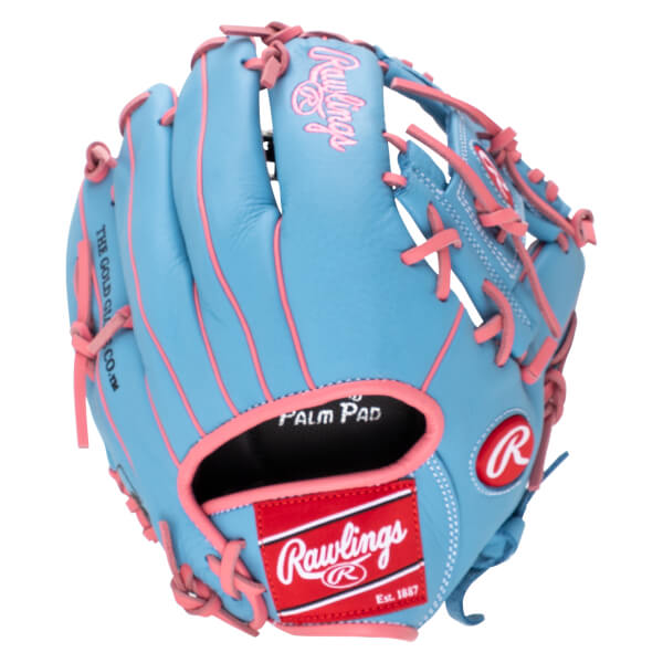 Front view of a light blue baseball glove with pink lacing, featuring a red Rawlings logo patch and "PALM PAD" text.