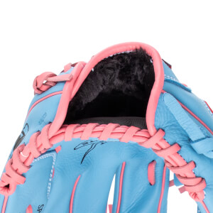 Close-up of a blue baseball glove with pink lacing and black fur lining.