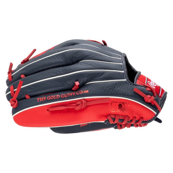 Side view of a navy and red baseball glove with white stitching and red lacing, showing "THE GOLD GLOVE CO.â„¢" text.