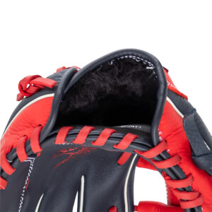Close-up of a baseball glove showing the red lacing, dark blue leather, and black interior lining.