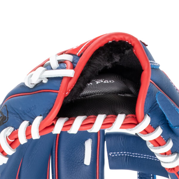 Close-up of a blue baseball glove with red and white lacing, showing the "PAD" logo inside.