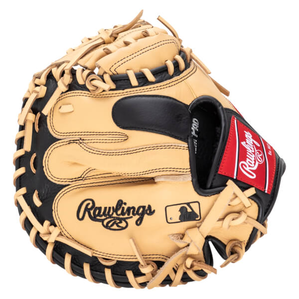 Front view of a tan and black Rawlings baseball glove with a red logo patch and MLB symbol.