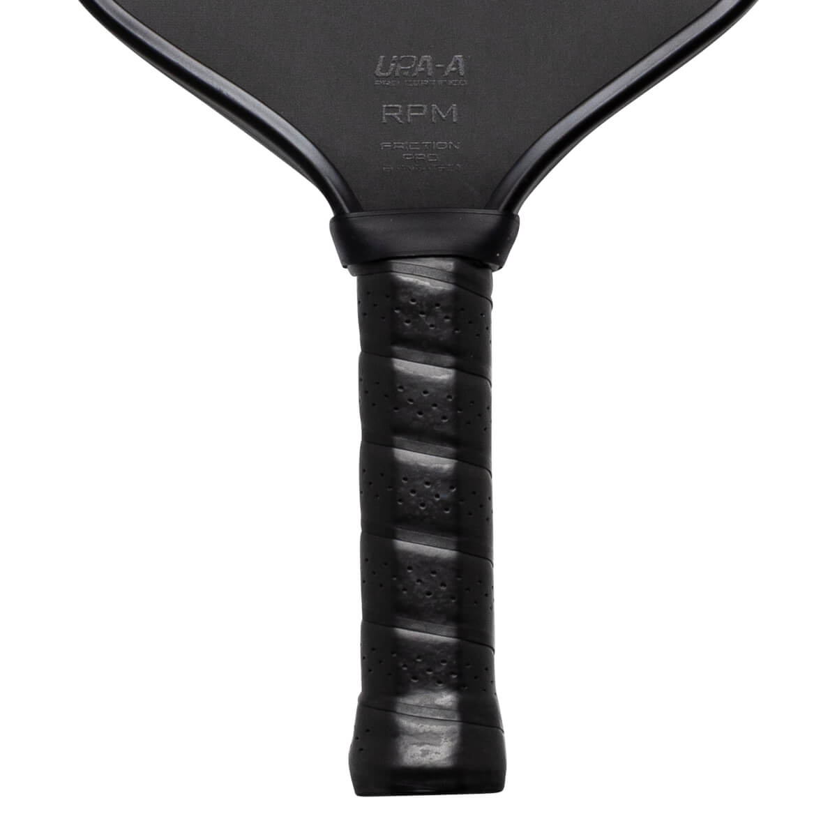 Close-up of a black pickleball paddle handle with "RPM" and "UPA-A" visible.