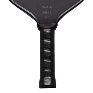 Close-up of a black pickleball paddle handle with "RPM" and "UPA-A" visible.