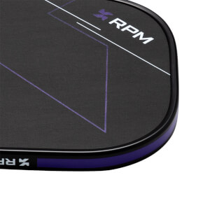 Corner view of the black pickleball paddle showing the white "RPM" logo and purple geometric lines.