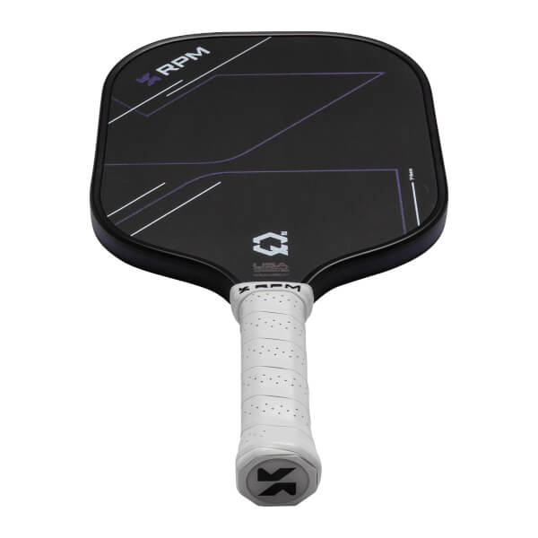 Angled view from the handle of a black pickleball paddle featuring a white grip, purple geometric lines, and the word RPM and a Q2 logo on the face.