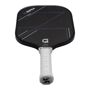 Angled view from the handle of a black pickleball paddle featuring a white grip, purple geometric lines, and the word RPM and a Q2 logo on the face.