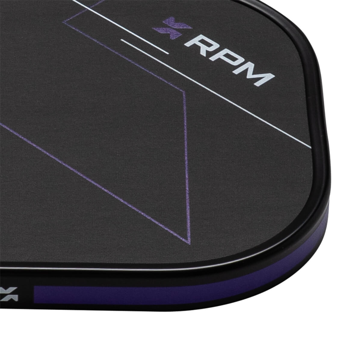 Close-up corner view of a black textured paddle face featuring purple geometric lines, a purple edge guard, and the word "RPM" in bold white letters.