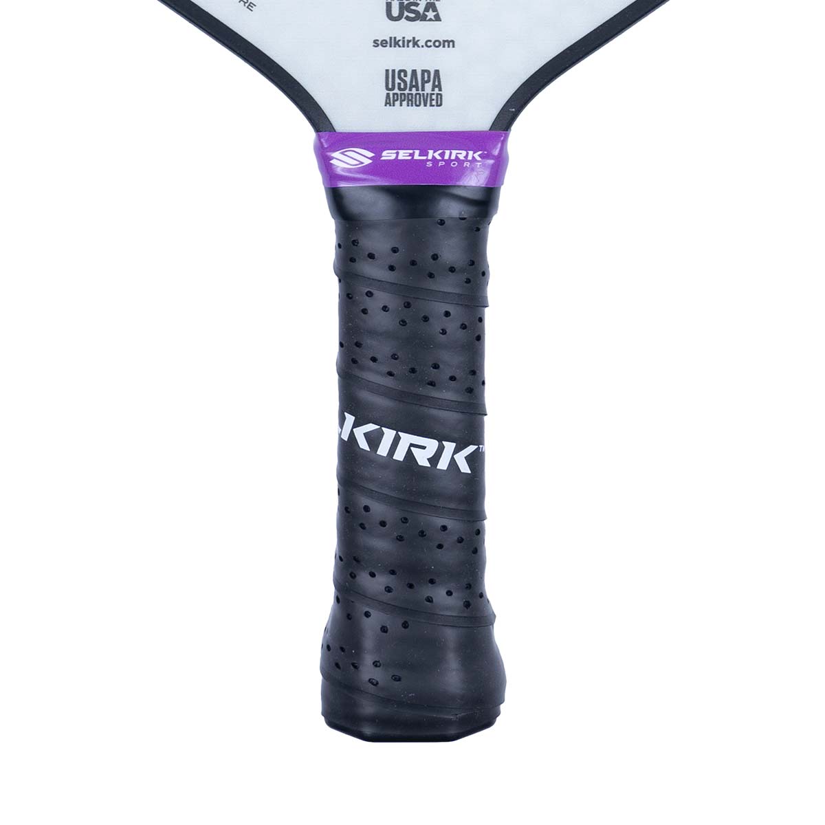 Close-up of a black pickleball paddle grip with a purple band and white KIRK text.