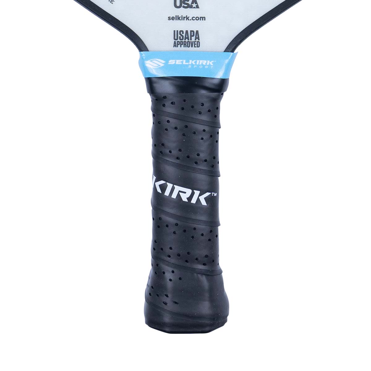 Close-up of a black pickleball paddle grip with perforated texture and KIRK branding.
