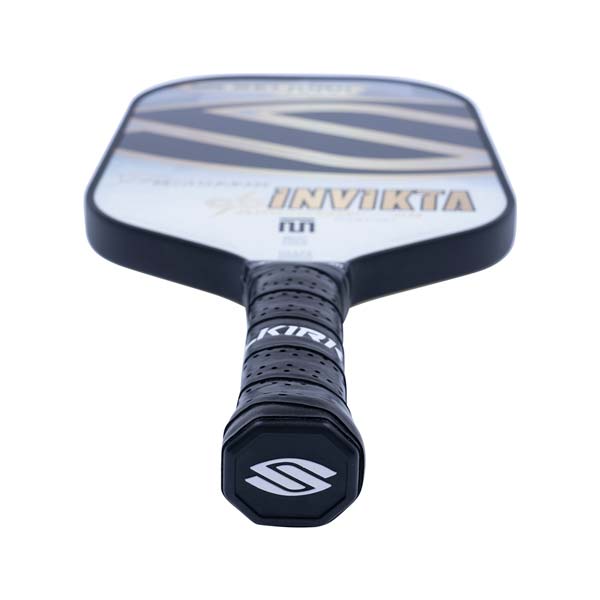 Top-down view of a white pickleball paddle with black grip, INV IKTA text, and a silver S logo.