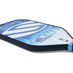 Side view of a blue and white pickleball paddle with Omni and Selkirk Sport branding.