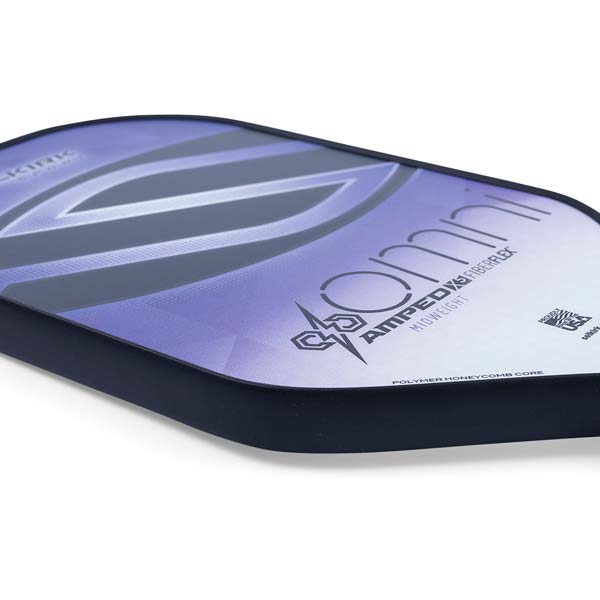 Corner view of a purple and white pickleball paddle with omni and AMPED X FIBERFLEX text.