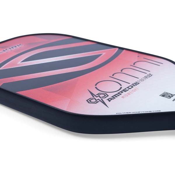 Corner view of a red and black pickleball paddle with OMNI and AMPED X FIBERFLEX text.