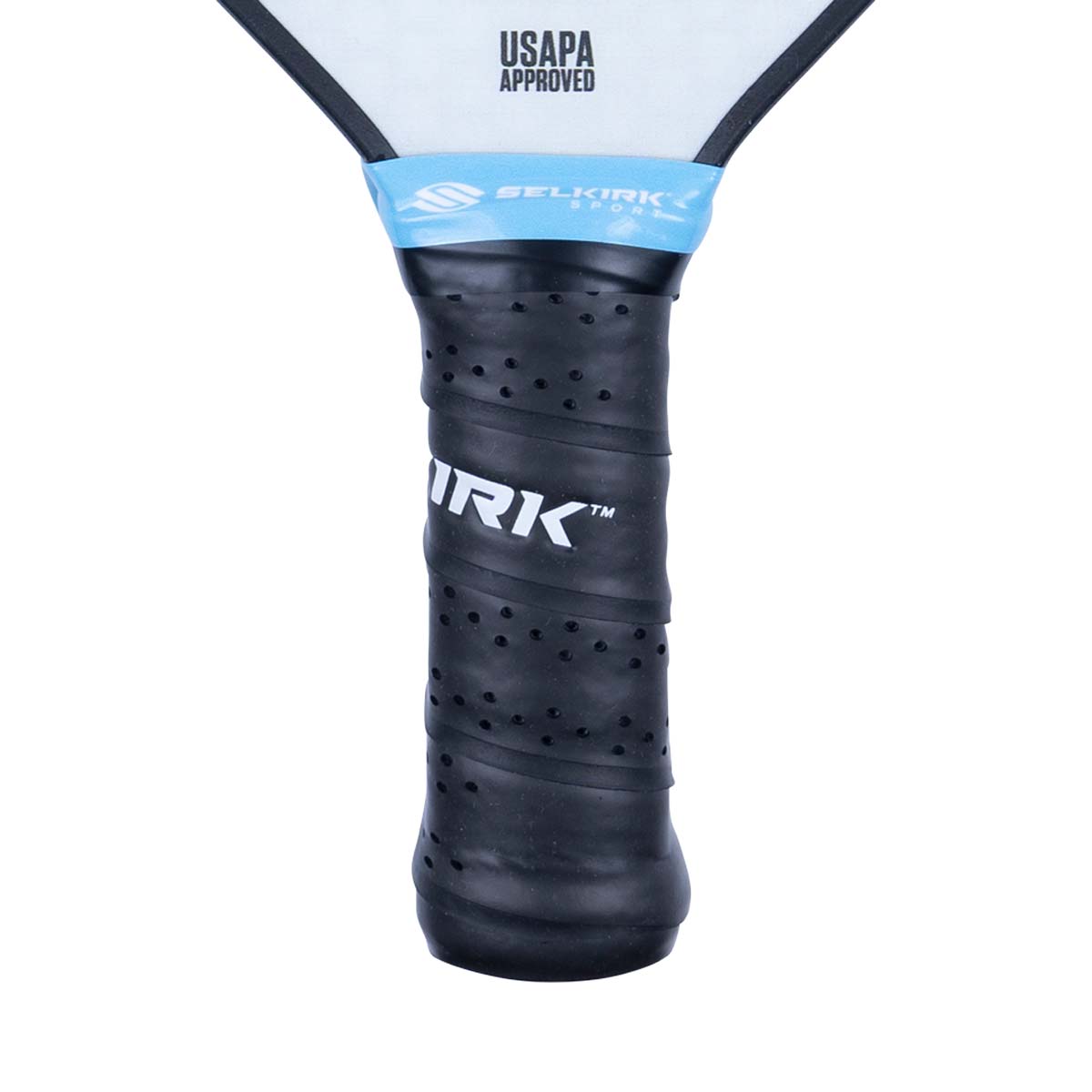 Close-up of a black pickleball paddle grip with IRK logo and USAPA APPROVED text.
