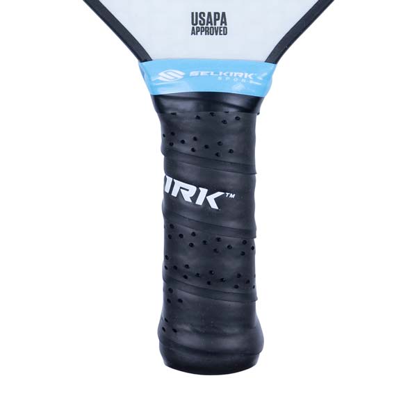 Close-up of a black pickleball paddle grip with IRK logo and USAPA APPROVED text.
