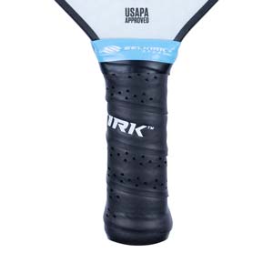 Close-up of a black pickleball paddle grip with IRK logo and USAPA APPROVED text.