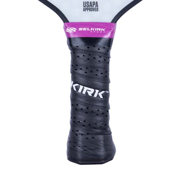 Close-up of a black pickleball paddle grip with KIRK branding and USAPA APPROVED text.