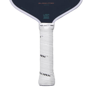 Close-up of a dark gray pickleball paddle with a white textured grip, SELKIRK logo, and ELONGATED text.