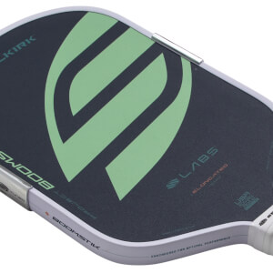 Angled close-up of a dark gray pickleball paddle with a large green graphic, LABS ELONGATED text, and white edge guard.