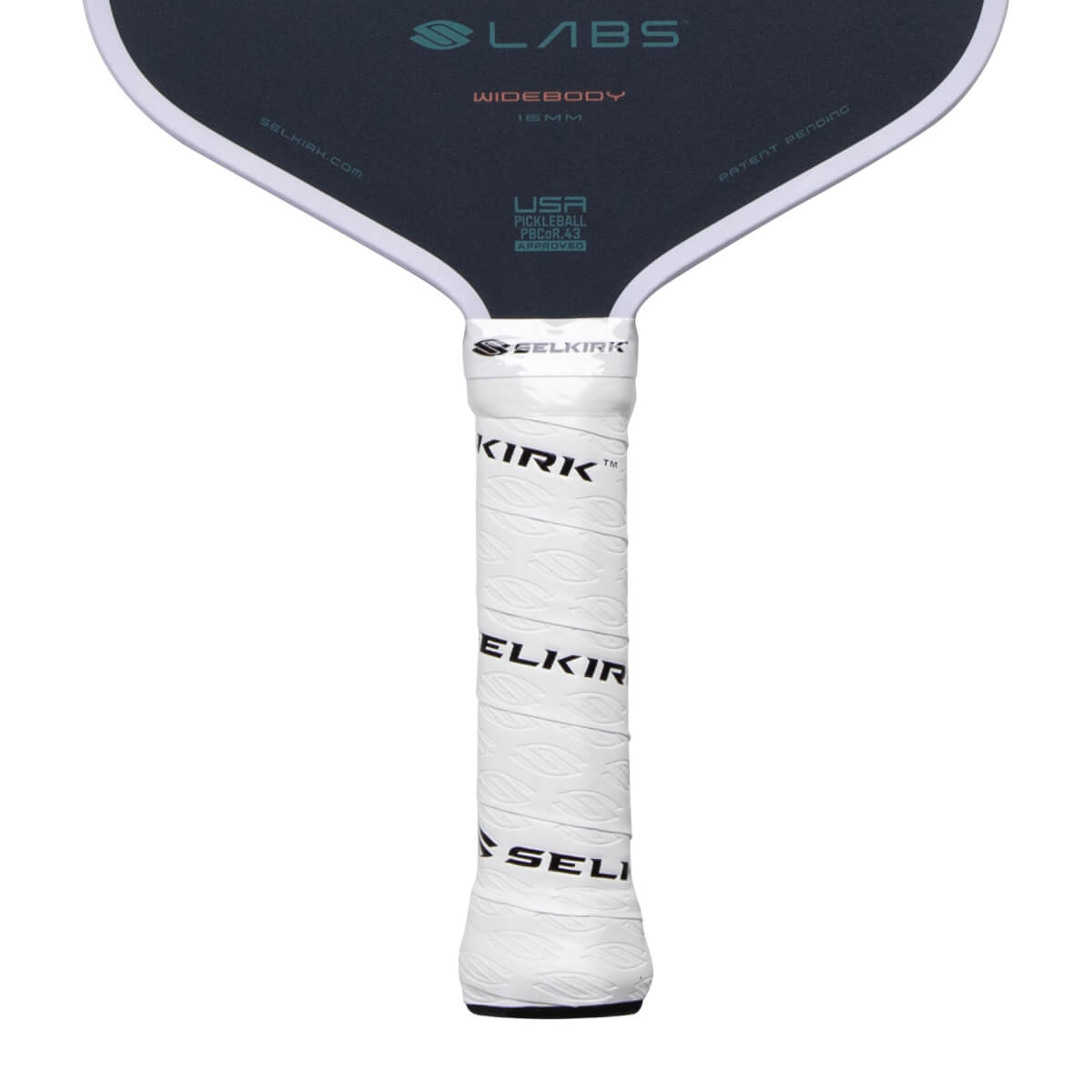 Close-up of a dark gray pickleball paddle with a white textured grip showing SELKIRK branding and LABS WIDEBODY on the face.