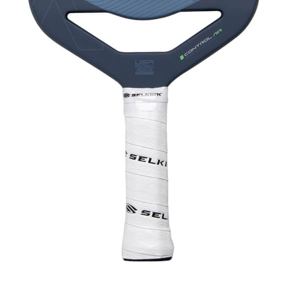Close-up of handle of a dark blue pickleball paddle with a white Selkirk grip, USA Pickleball Approved, and Control Air text.