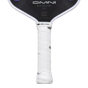 Close-up of a pickleball paddle grip showing the white textured grip and the "SELKIRK" logo.