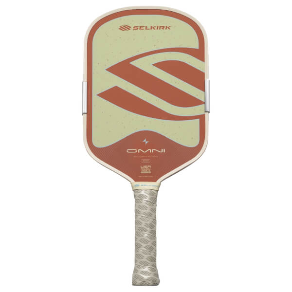 Front view of a Selkirk OMNI pickleball paddle with a tan and rust design, featuring the Selkirk logo and "OMNI" text.