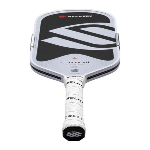Top-down view of a white Selkirk pickleball paddle with a black and gray design, showing the "OMNI ELONGATED" text and "16MM" thickness.