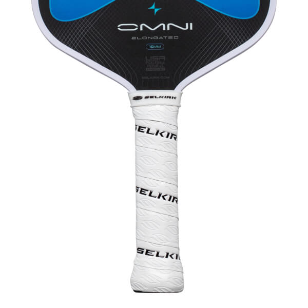 Top-down view of a pickleball paddle showing the "OMNI ELONGATED" text, a blue graphic, and a white textured grip with "SELKIRK" branding.