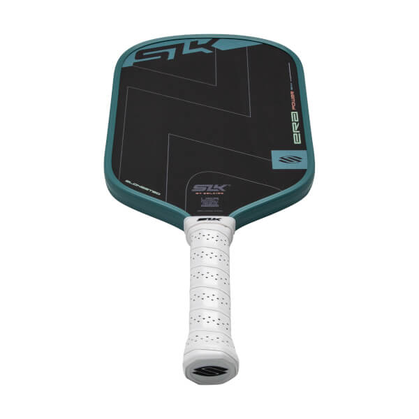 Angled front view of a black pickleball paddle with teal geometric graphics, a teal edge guard, and a white perforated grip.