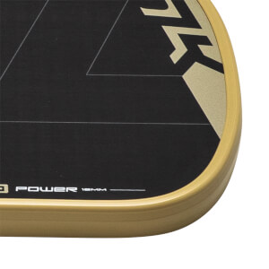 Close-up of a black and gold pickleball paddle with a gold edge guard and POWER 16MM text.