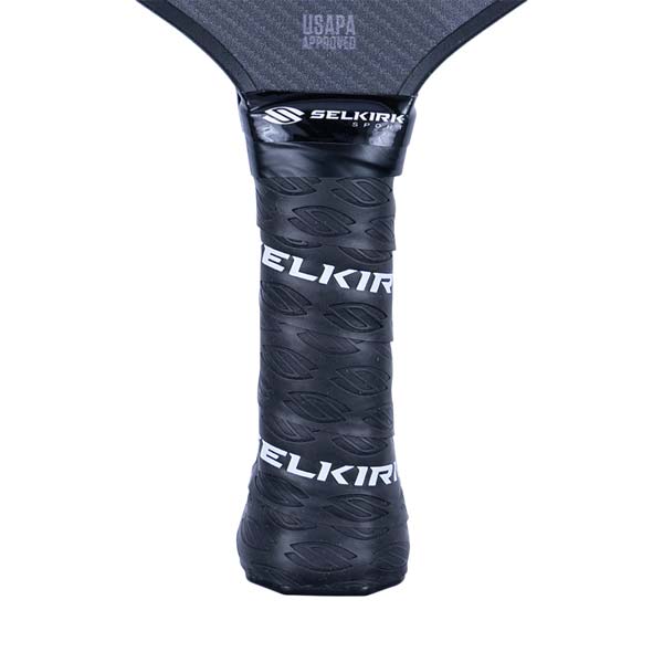 Close-up of a black pickleball paddle grip with white ELKIR text and USAPA APPROVED stamp.