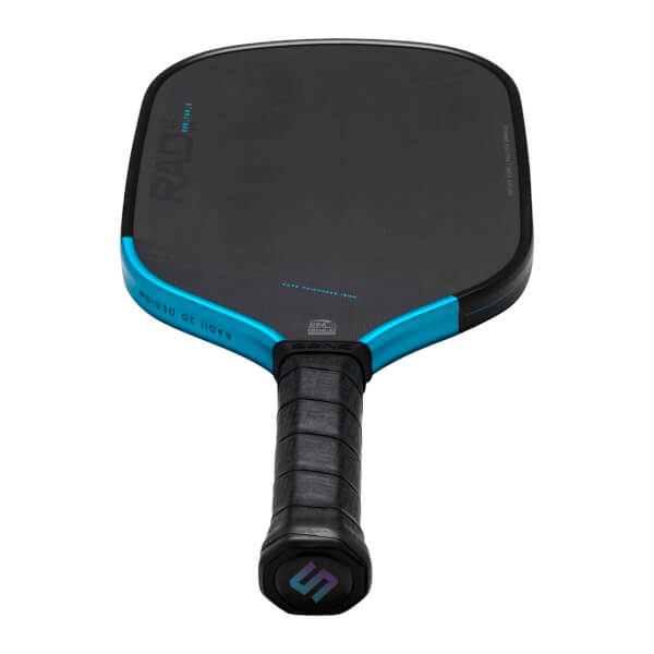 Top-down view of a black pickleball paddle with a blue edge, showing "RADI 2D DESIGN" and "POLYTEXT SURFACE" text.