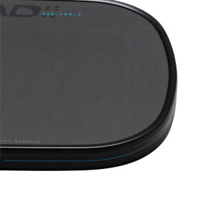Corner view of a black paddle with "HEAD RAD_700_E" and "TEX SURFACE" text.