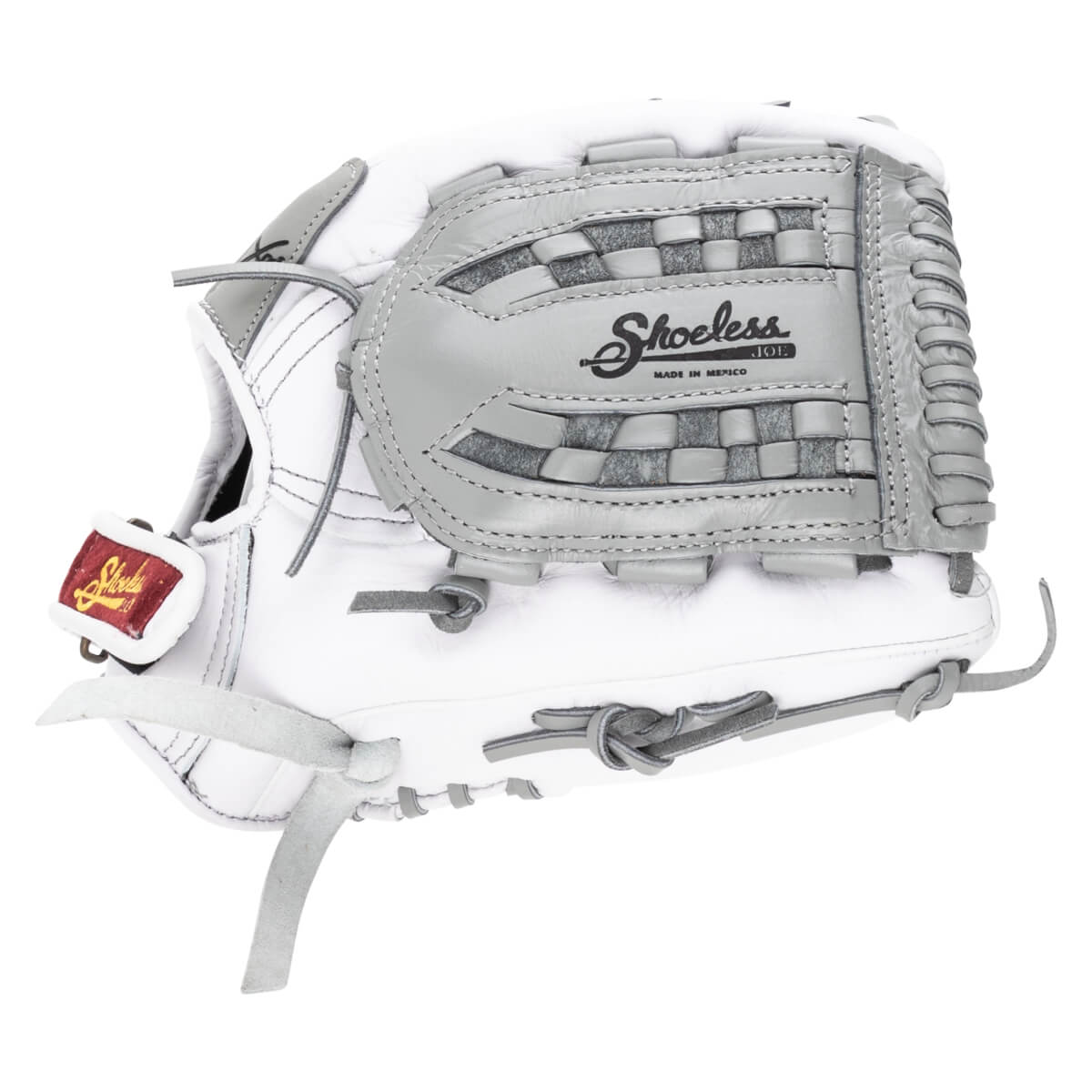 Front view of a white and gray baseball glove with "Shoeless Joe" and "Made in Mexico" visible.