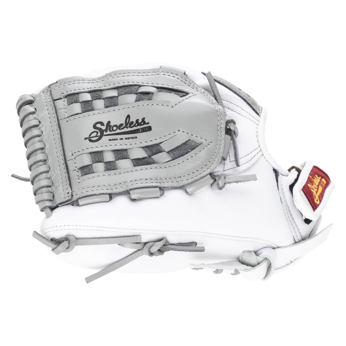 Side view of a white and grey baseball glove with "Shoeless Joe" logo and "Made in Mexico" text.