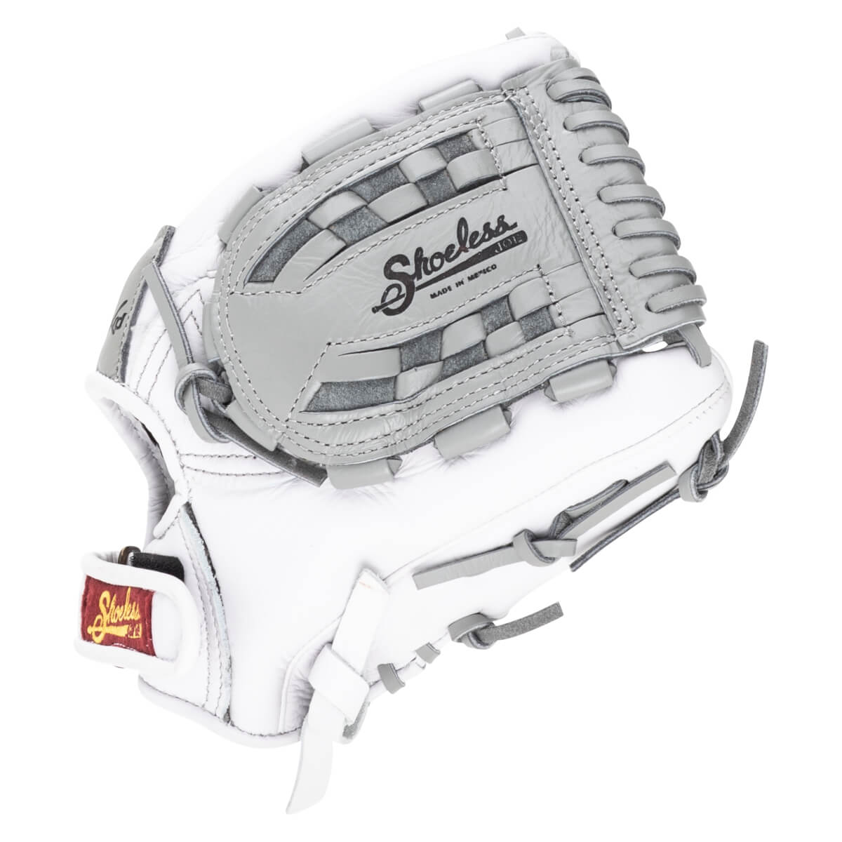 Side view of a white and gray baseball glove with "Shoeless Joe" and "Made in Mexico" visible.